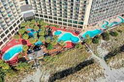 Cozy ocean front condo w/ Relaxing Pool + Cozy King Bed